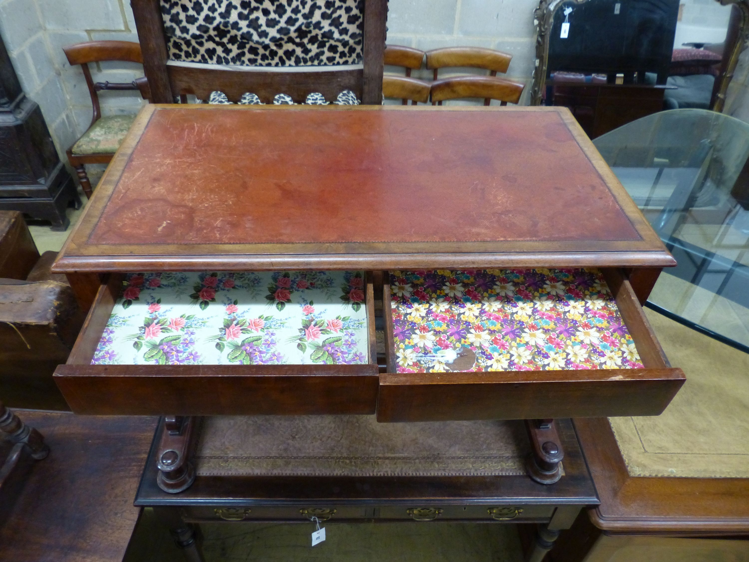 A Victorian mahogany writing table with two frieze drawers, width 92cm